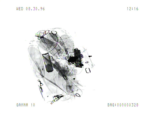 Luggage_X_3_3_10 (1996/2011), Marie Sester. Still from the Luggage_X_3_3 video recordings at Orly Airport, Paris Digital print 7.11" x 9.45" (18.06 cm x 24 cm), Edition of 20