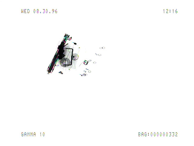 Luggage_X_3_3_13 (1996/2011), Marie Sester. Still from the Luggage_X_3_3 video recordings at Orly Airport, Paris Digital print 7.11" x 9.45" (18.06 cm x 24 cm), Edition of 20