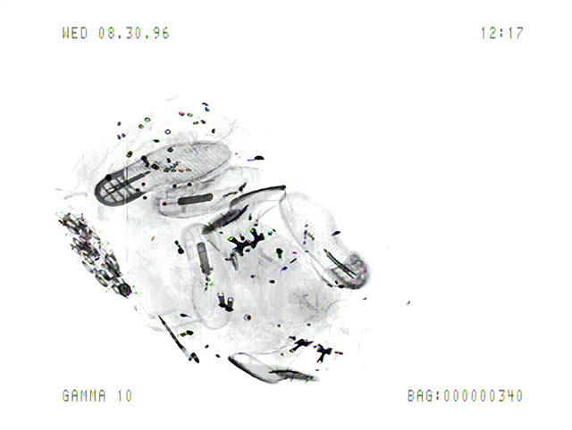 Luggage_X_3_3_20 (1996/2011), Marie Sester. Still from the Luggage_X_3_3 video recordings at Orly Airport, Paris Digital print 7.11" x 9.45" (18.06 cm x 24 cm), Edition of 20