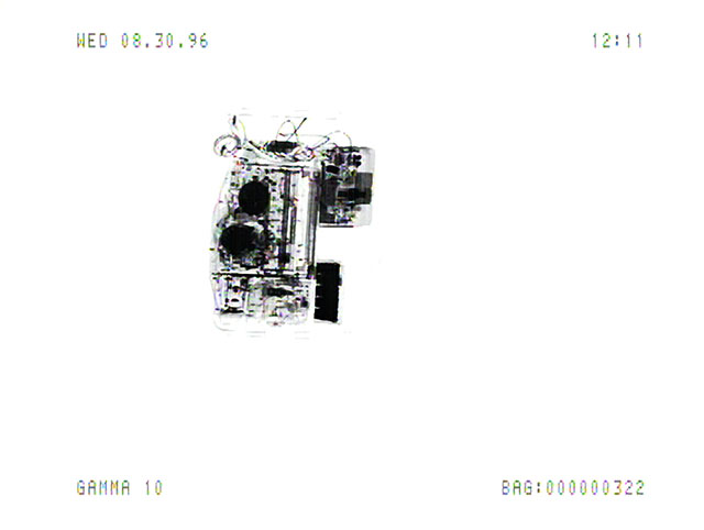 Luggage_X_3_3_3 (1996/2011), Marie Sester. Still from the Luggage_X_3_3 video recordings at Orly Airport, Paris Digital print 7.11" x 9.45" (18.06 cm x 24 cm), Edition of 20