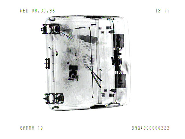 Luggage_X_3_3_5 (1996/2011), Marie Sester. Still from the Luggage_X_3_3 video recordings at Orly Airport, Paris Digital print 7.11" x 9.45" (18.06 cm x 24 cm), Edition of 20