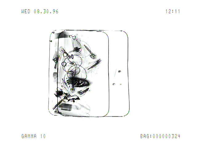 Luggage_X_3_3_7 (1996/2011), Marie Sester. Still from the Luggage_X_3_3 video recordings at Orly Airport, Paris Digital print 7.11" x 9.45" (18.06 cm x 24 cm), Edition of 20